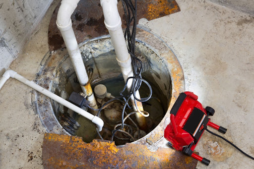 A sump pump with a light on it.
